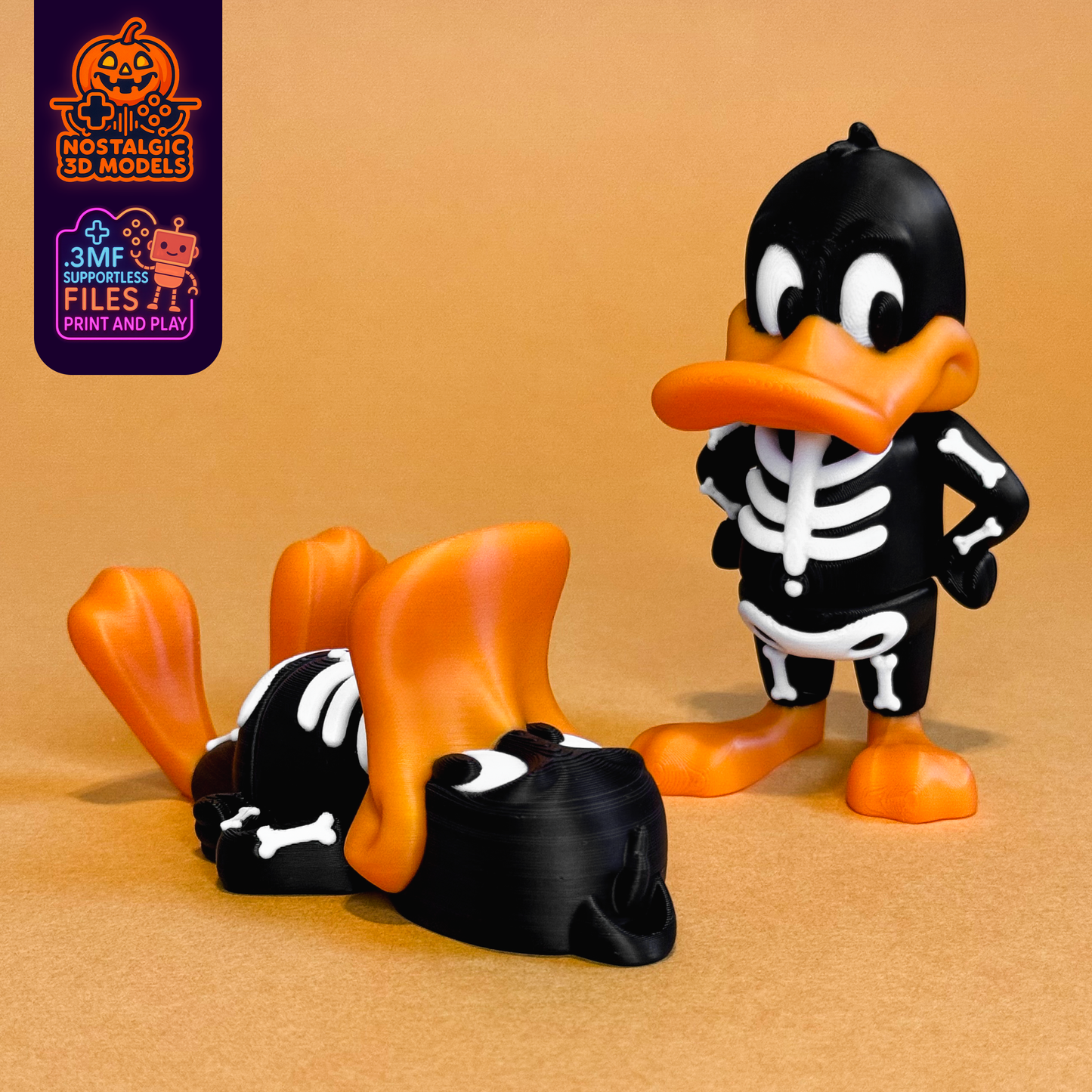 Two 3D-printed figures of Daffy Duck in skeleton costumes. One Daffy stands upright with a smug expression and arms on hips, while the other lies flat on his back with feet up in the air as if dramatically defeated. Both figures feature vibrant orange beaks and feet, and black suits with white bones. Set against a plain caramel-brown background, the image captures a playful Halloween vibe with the characters in classic cartoon style. The corner includes graphics for "Nostalgic 3D Models" and ".3MF Supportle