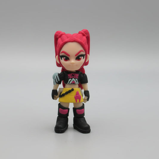 Front view of a 3D printed Mira figure from Kpop Demon Hunters, featuring bright red hair styled in twin buns, a confident expression, black graphic shirt, yellow skirt with pink detail, and black boots, displayed on a neutral background.