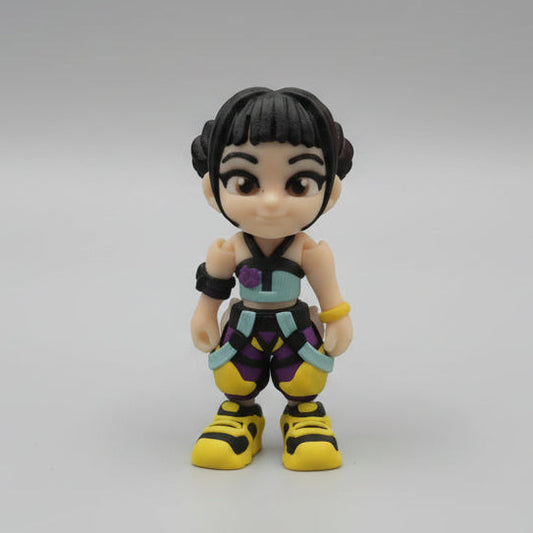 Front view of a 3D printed Zoey figure from Kpop Demon Hunters, featuring black hair styled in two buns, a soft confident expression, a detailed outfit with teal and purple accents, and bright yellow shoes, displayed on a neutral background.