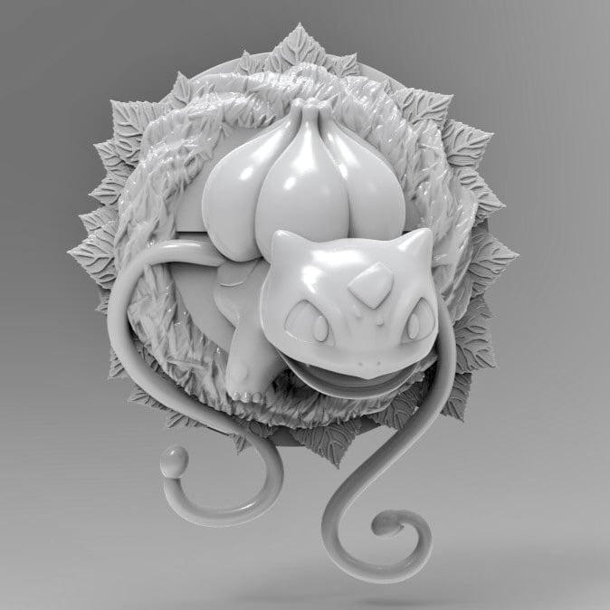 A detailed 3D printed wall decor piece of Bulbasaur, the Pokémon. The design shows Bulbasaur emerging from a circular leafy base with its bulb raised high and tail wrapping around the bottom edge, creating a dynamic and bold display piece. The image highlights the fine detail of the print in smooth grey resin.