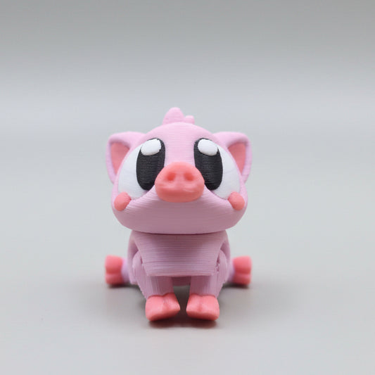 Pink piglet, with big eyes and a cute snout sitting on his bottom.