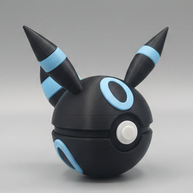Side view of Full Moon Umbreon inspired Pokéball 3D print showing black colouring, blue ring markings, tall ears, and moon themed details.