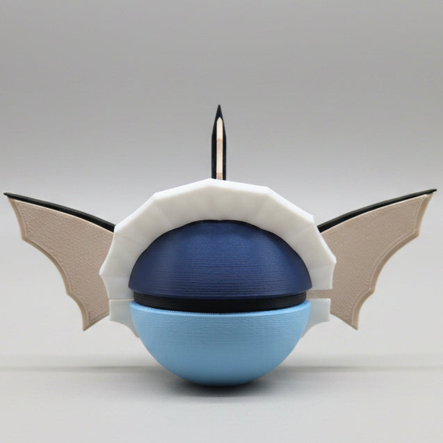 Back view of a 3D printed Vaporeon inspired Pokéball collectible featuring Vaporeon’s blue colouring, large fin shaped ears, tall head crest, and aquatic tail-inspired details. A Pokémon themed display piece showing the full design from behind on a grey background.