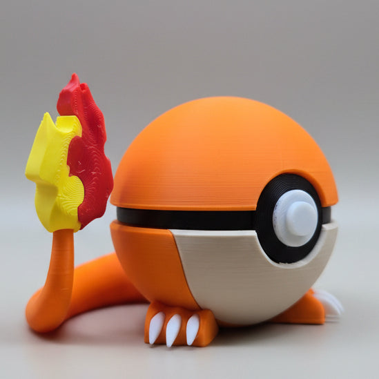 Angled view of a Charmander Poké Ball design showing the curved orange shell, white button detail, clawed feet, and red and yellow flame tail.
