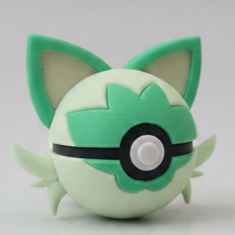 Sprigatito inspired 3D printed Pokéball collectible featuring soft green colouring, cat ears, leafy face details, and adorable Grass-type Pokémon themed design for fans and collectors.