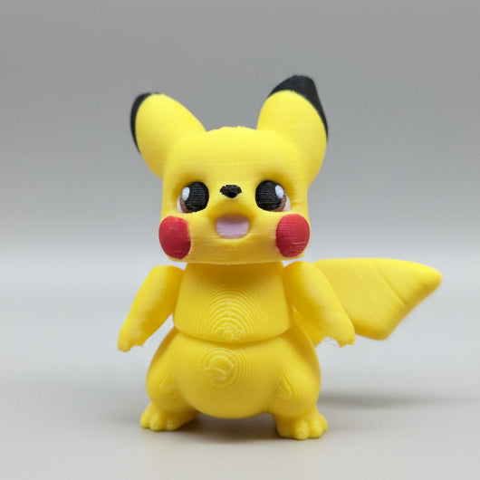 Front-facing 3D printed Pikachu figure with expressive eyes, red cheeks, and articulated body joints