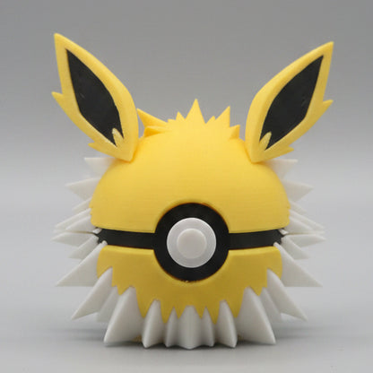 Jolteon inspired 3D printed Pokéball collectible featuring bright yellow design, pointed ears, spiky white fur details, and electric themed style perfect for Pokémon fans.