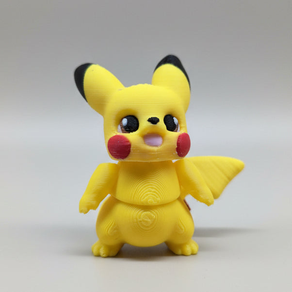 3D printed Pikachu flexi figure in bright yellow with red cheeks and black-tipped ears, shown from the front with lightning bolt tail on a neutral grey background