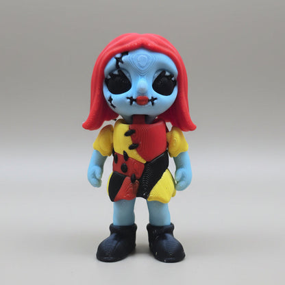 Slight angled front view of a Sally flexi figure showing dress and facial details