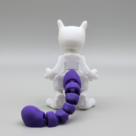Back view of a Mewtwo 3D printed flexi figure with segmented tail